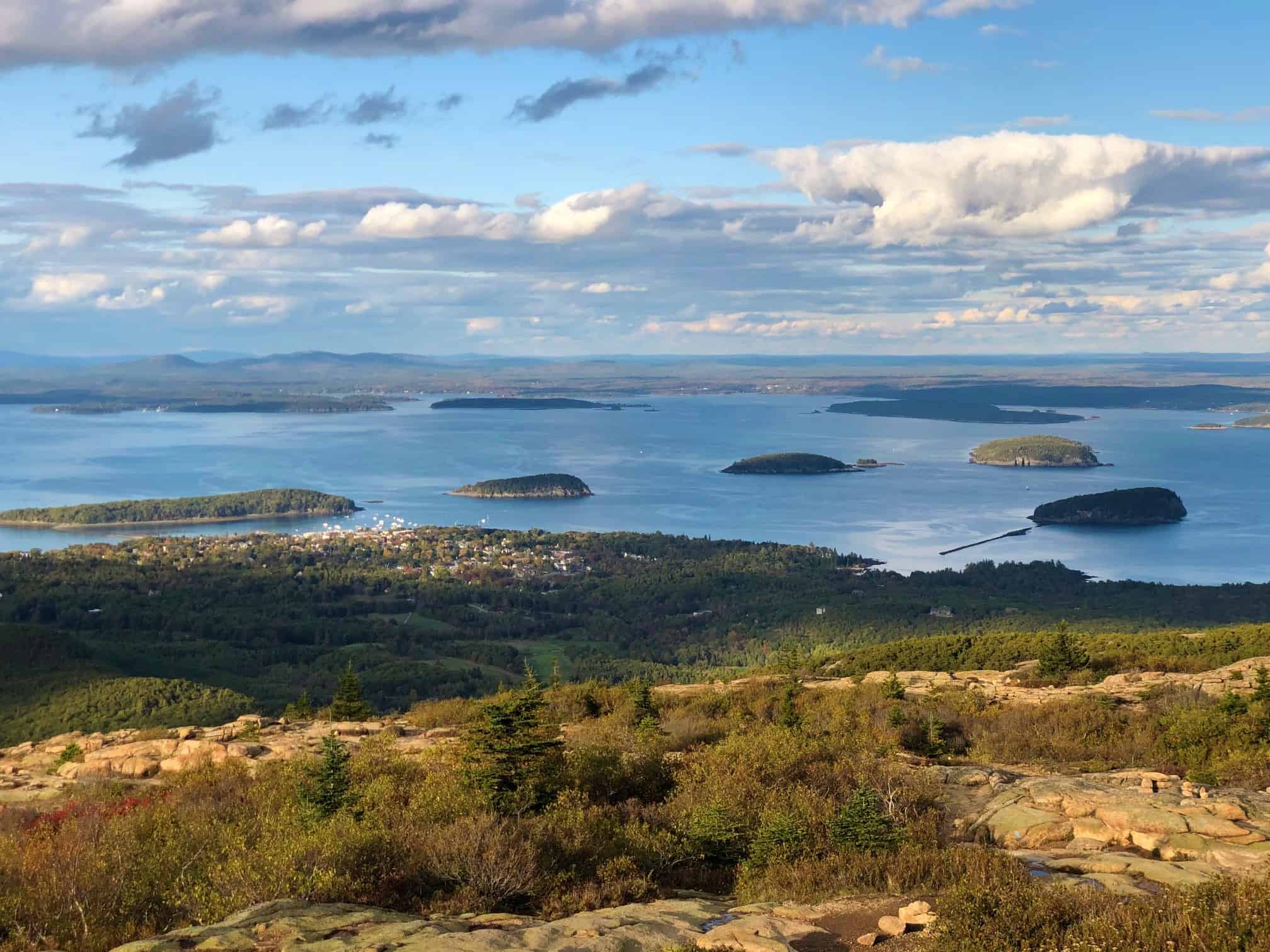 A view of Bar Harbor and the islands from the summit of Cadillac Mountain. best road trip new england